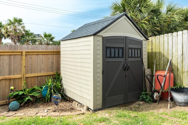 29 Quintana Dr, Galveston, TX 77554 - view of shed with a fenced backyard