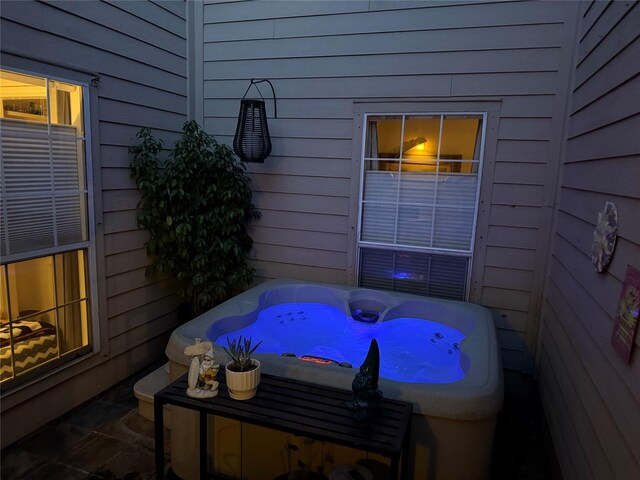 29 Quintana Dr, Galveston, TX 77554 - view of patio with a hot tub