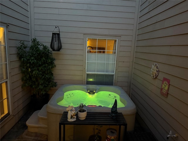 29 Quintana Dr, Galveston, TX 77554 - view of patio featuring a jacuzzi