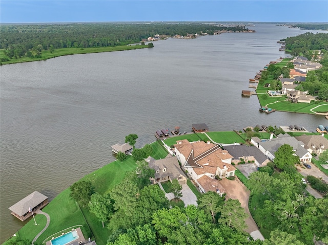 19926 Gemstone Dr, Montgomery, TX 77356 - aerial view of property and surrounding area with a large body of water and nearby suburban area