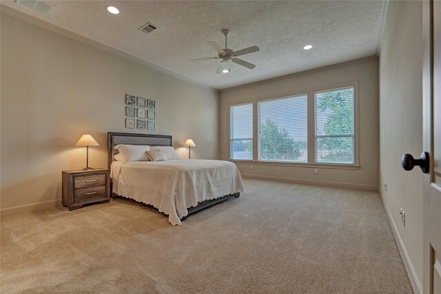 19926 Gemstone Dr, Montgomery, TX 77356 - bedroom with crown molding, baseboards, light colored carpet, recessed lighting, and a textured ceiling