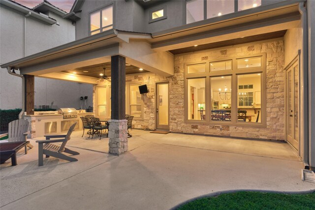 19926 Gemstone Dr, Montgomery, TX 77356 - view of patio with an outdoor kitchen, grilling area, and outdoor dining area