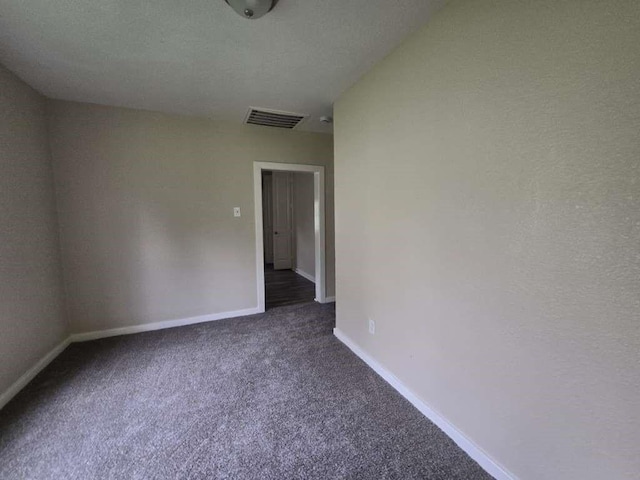 1300 Burbank St, Baytown, TX 77520 - carpeted spare room featuring baseboards