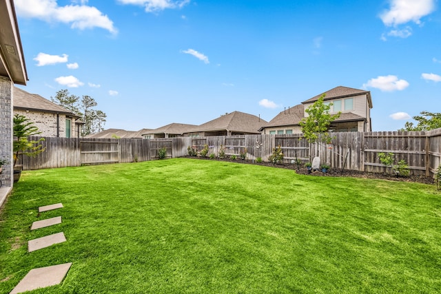 view of yard featuring a residential view