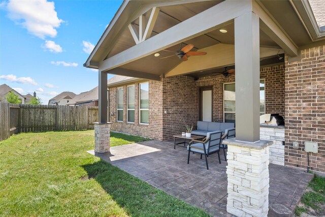 2023 Aspen Point Ln, Richmond, TX 77469 - view of patio featuring a ceiling fan and an outdoor living space