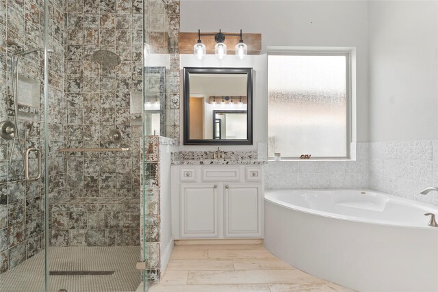 2023 Aspen Point Ln, Richmond, TX 77469 - full bathroom with a garden tub, a stall shower, and vanity