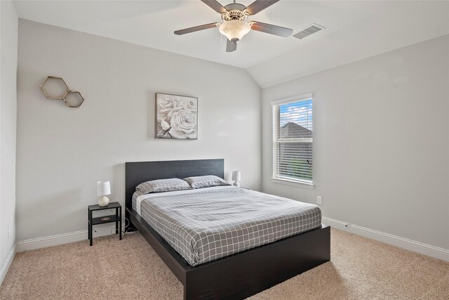 2023 Aspen Point Ln, Richmond, TX 77469 - bedroom with light carpet, baseboards, vaulted ceiling, and a ceiling fan