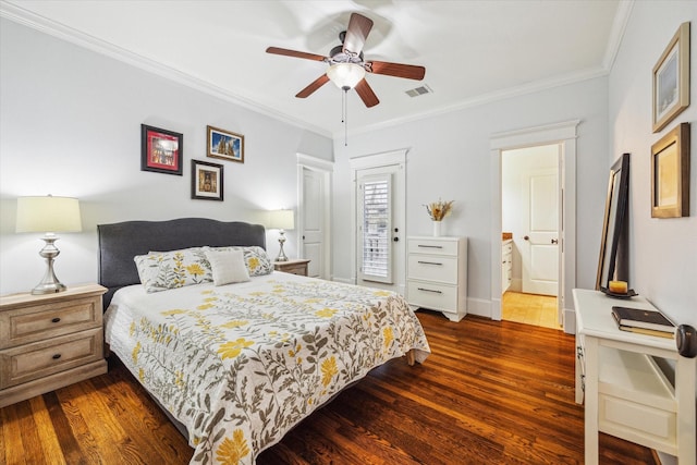 300 E 26th St, Houston, TX 77008 - bedroom with dark wood finished floors, ornamental molding, a ceiling fan, and baseboards