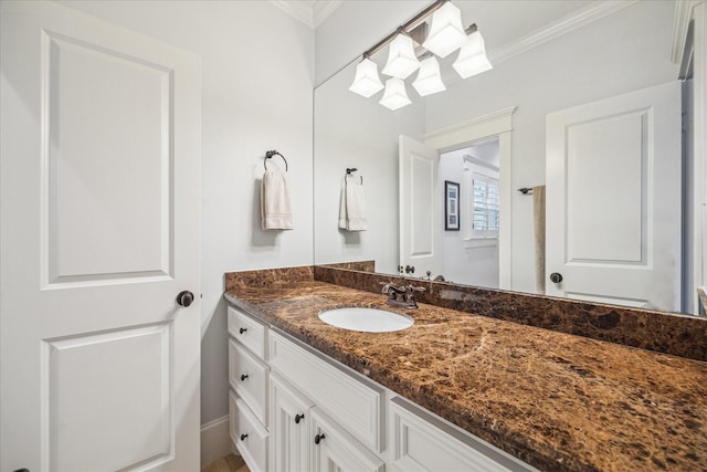 300 E 26th St, Houston, TX 77008 - bathroom with ornamental molding and vanity