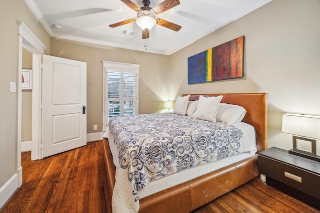 300 E 26th St, Houston, TX 77008 - bedroom featuring ornamental molding, wood finished floors, baseboards, and a ceiling fan