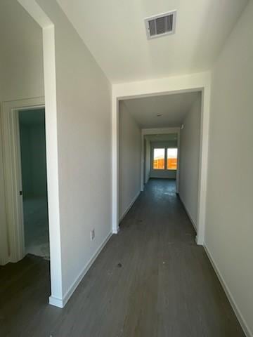 1202 Garrett Sudhendrio Dr, Crosby, TX 77532 - hallway featuring wood finished floors and baseboards