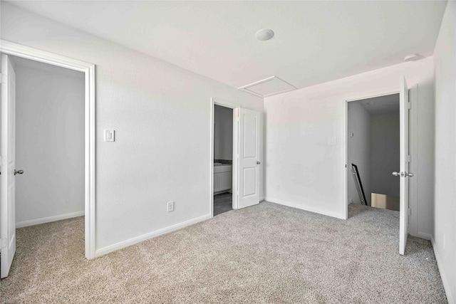 unfurnished bedroom with carpet and baseboards
