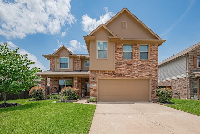 2812 Baywater Creek Ln, Pearland, TX 77089 - view of front facade with an attached garage, concrete driveway, a front lawn, brick siding, and stucco siding