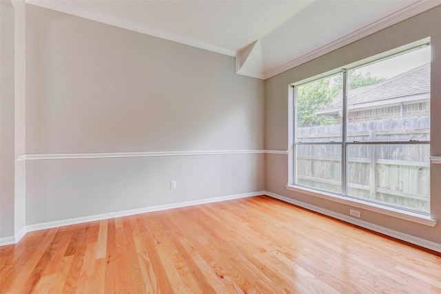 14418 Dunsmore Pl, Cypress, TX 77429 - spare room featuring wood finished floors and crown molding
