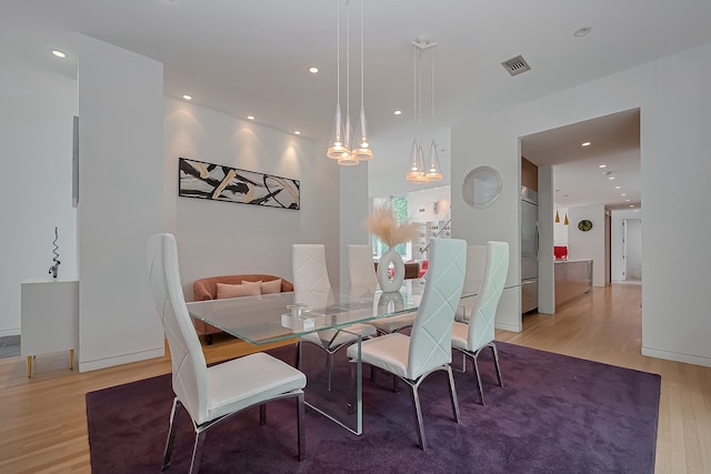 118 Angel Leaf Rd, The Woodlands, TX 77380 - dining space with light wood-type flooring and recessed lighting