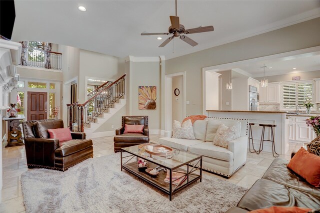 19 Royal Hampton Ct, Sugar Land, TX 77479 - living area with stairs, recessed lighting, crown molding, a ceiling fan, and baseboards