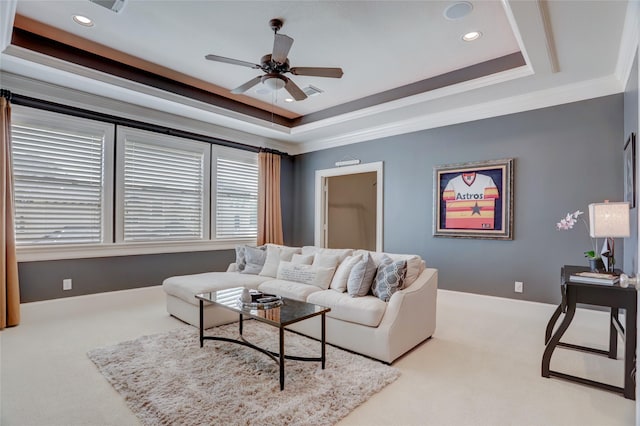 19 Royal Hampton Ct, Sugar Land, TX 77479 - carpeted living room featuring a ceiling fan, a tray ceiling, crown molding, recessed lighting, and baseboards
