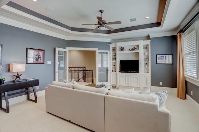 19 Royal Hampton Ct, Sugar Land, TX 77479 - living room featuring a tray ceiling, ceiling fan, light colored carpet, crown molding, and recessed lighting
