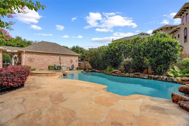 19 Royal Hampton Ct, Sugar Land, TX 77479 - view of swimming pool with a patio area, a fenced backyard, and a pool with connected hot tub