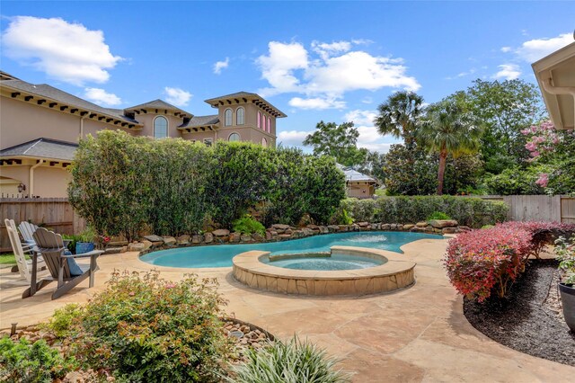 19 Royal Hampton Ct, Sugar Land, TX 77479 - view of pool with fence, an in-ground hot tub, and a patio