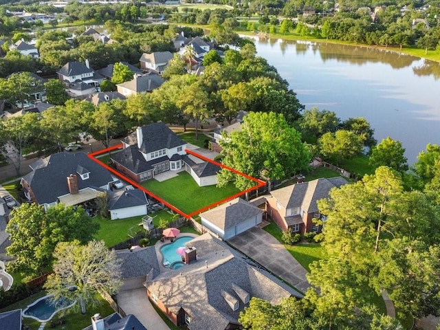 4614 Jamaica Dr, Sugar Land, TX 77479 - aerial perspective of suburban area with a nearby body of water and property boundaries highlighted
