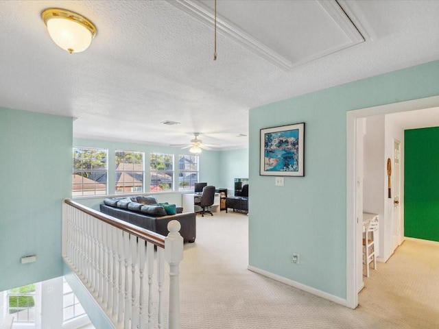 4614 Jamaica Dr, Sugar Land, TX 77479 - hall with carpet flooring, an office area, baseboards, attic access, and a textured ceiling
