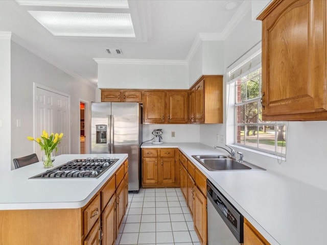 4614 Jamaica Dr, Sugar Land, TX 77479 - kitchen featuring appliances with stainless steel finishes, a sink, light countertops, brown cabinetry, and ornamental molding