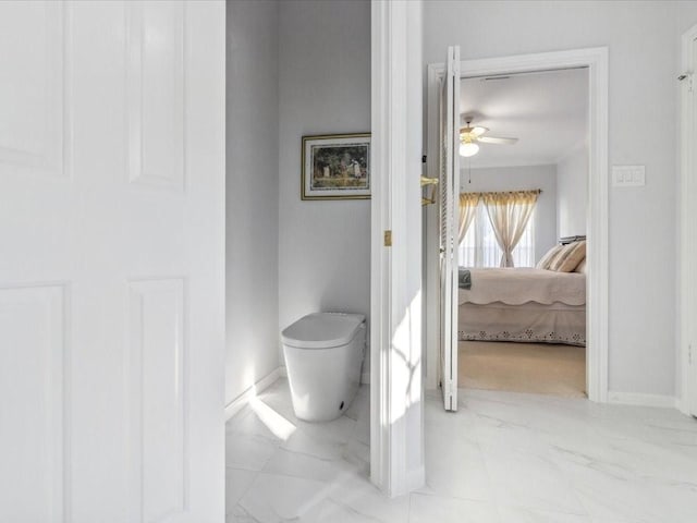 4614 Jamaica Dr, Sugar Land, TX 77479 - bathroom featuring ceiling fan, toilet, baseboards, and ensuite bath