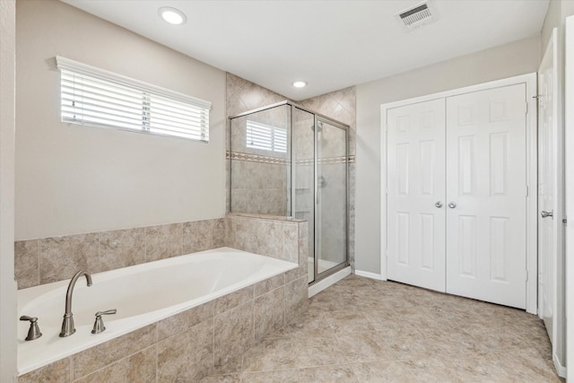 10906 Harvest Sun Dr, Houston, TX 77064 - full bath with a shower stall and a garden tub