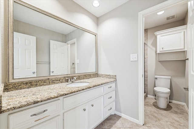 10906 Harvest Sun Dr, Houston, TX 77064 - bathroom featuring vanity, toilet, baseboards, and tile patterned floors