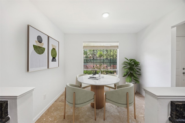 dining space with baseboards
