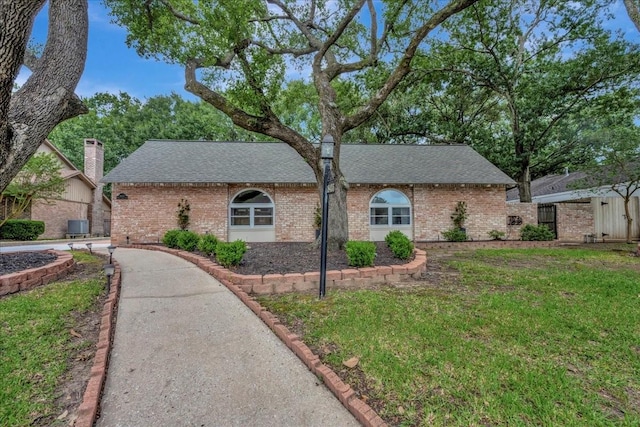 18435 Point Lookout Dr, Houston, TX 77058 - single story home with a shingled roof, brick siding, and a front lawn