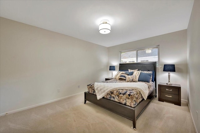 18435 Point Lookout Dr, Houston, TX 77058 - bedroom with light carpet and baseboards