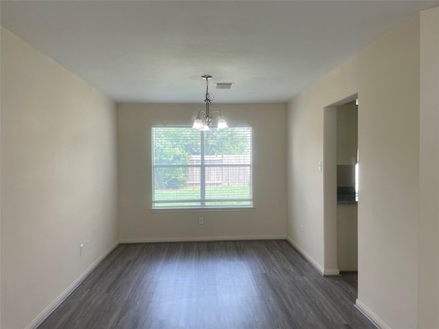 5918 Fergis Dr, Katy, TX 77449 - unfurnished dining area featuring dark wood-style flooring, a chandelier, and baseboards