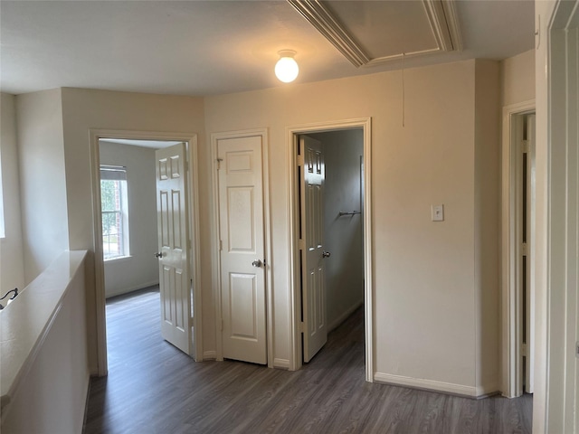 5918 Fergis Dr, Katy, TX 77449 - hall with attic access, dark wood-type flooring, and baseboards