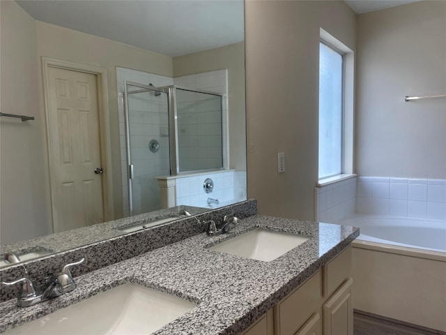 5918 Fergis Dr, Katy, TX 77449 - full bathroom featuring a shower stall, a bath, and double vanity