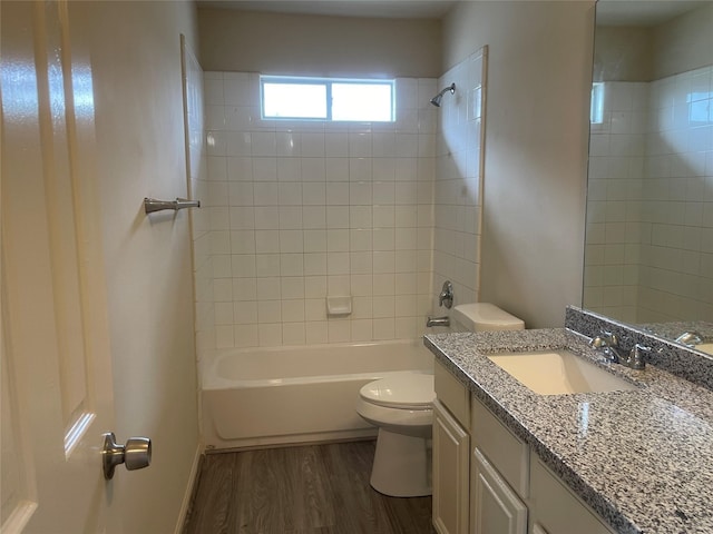 5918 Fergis Dr, Katy, TX 77449 - bathroom with toilet, wood finished floors, shower / bathtub combination, and vanity