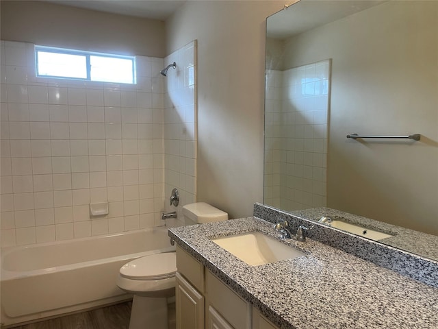 5918 Fergis Dr, Katy, TX 77449 - full bathroom featuring toilet, shower / washtub combination, wood finished floors, and vanity