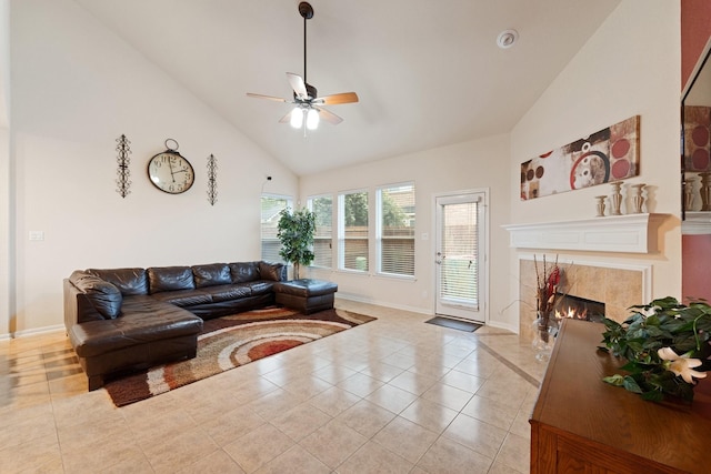 6307 Mercer Ct, Missouri City, TX 77459 - living room with high vaulted ceiling, ceiling fan, a premium fireplace, baseboards, and light tile patterned floors