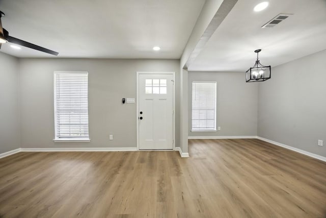 4442 Oak Shadows Dr, Houston, TX 77091 - entryway featuring baseboards, light wood-type flooring, recessed lighting, and a chandelier