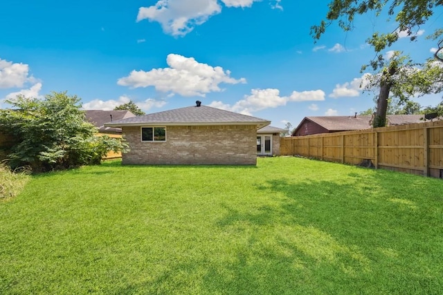 4442 Oak Shadows Dr, Houston, TX 77091 - back of property featuring brick siding and a shingled roof