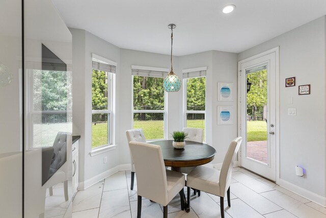 6203 Aspen Pass Dr, Kingwood, TX 77345 - dining space with baseboards and recessed lighting