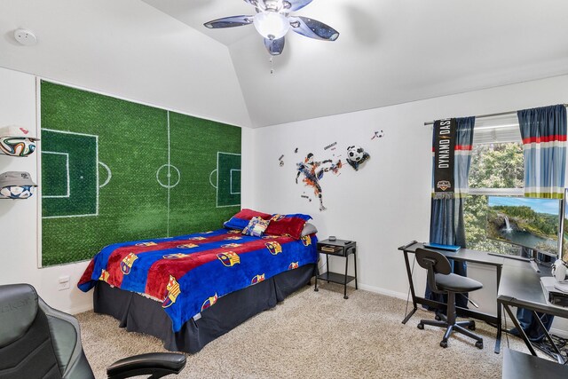 6203 Aspen Pass Dr, Kingwood, TX 77345 - carpeted bedroom featuring vaulted ceiling, ceiling fan, baseboards, and an office area