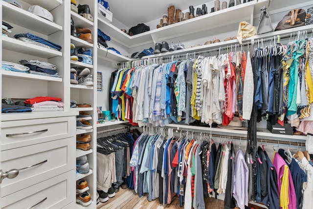 6203 Aspen Pass Dr, Kingwood, TX 77345 - spacious closet with light wood finished floors