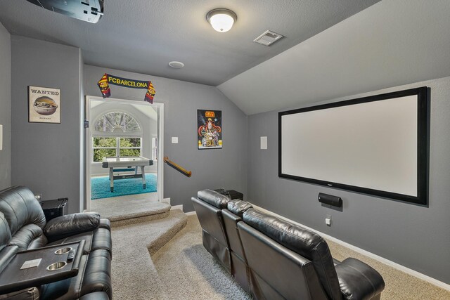 6203 Aspen Pass Dr, Kingwood, TX 77345 - cinema with carpet floors, vaulted ceiling, and baseboards