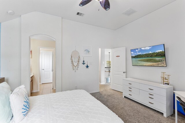 6203 Aspen Pass Dr, Kingwood, TX 77345 - bedroom with carpet floors, ceiling fan, vaulted ceiling, and baseboards