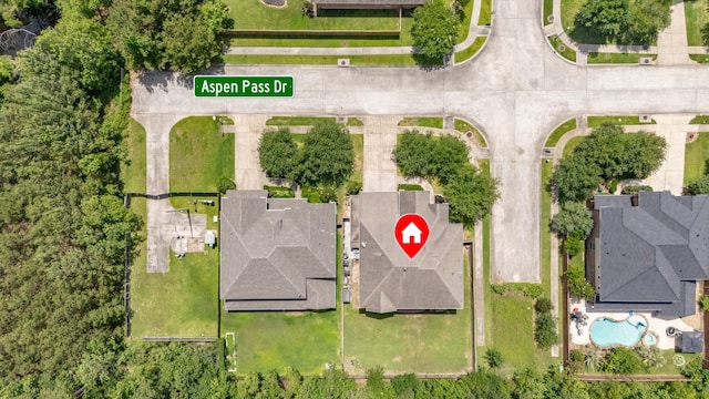 6203 Aspen Pass Dr, Kingwood, TX 77345 - drone / aerial view of a pool area