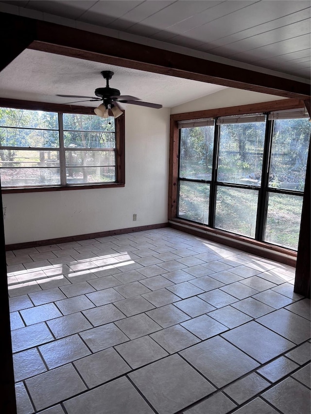 16477 Piper Ln, Montgomery, TX 77316 - spare room featuring baseboards, a ceiling fan, and plenty of natural light