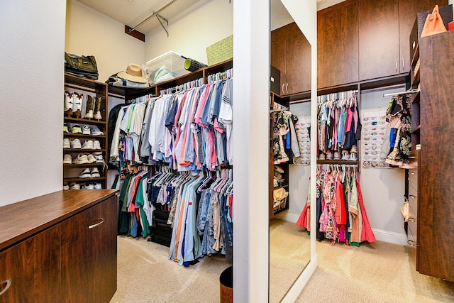 28011 Burnett Hills Ln, Fulshear, TX 77441 - walk in closet featuring carpet