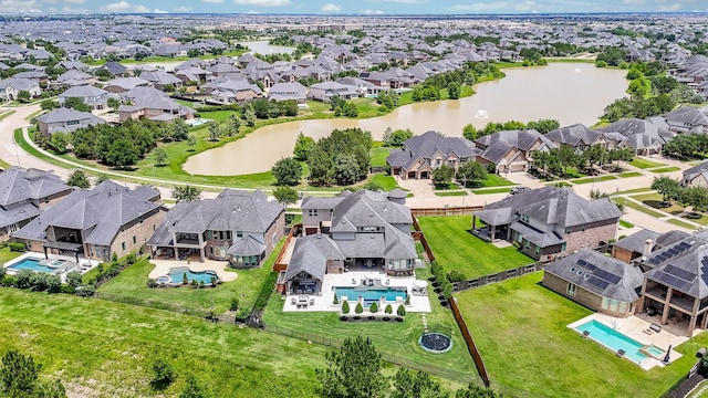 28011 Burnett Hills Ln, Fulshear, TX 77441 - aerial perspective of suburban area with a pool area and a large body of water